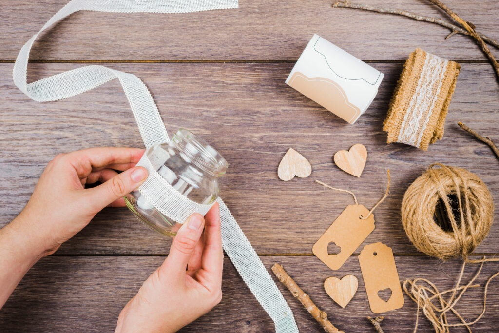 person preparing their DIY wedding favors.