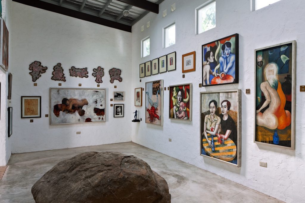 a museum with displayed paintings
