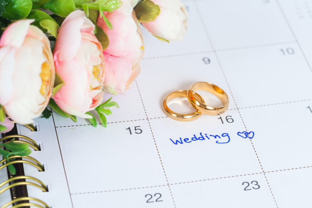 Wedding note on a calendar sets a reminder for the wedding day