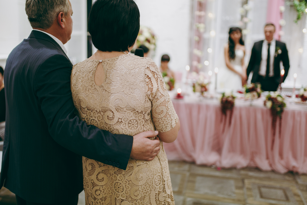 back view of parents at wedding