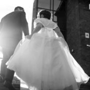 bride and groom walking on staircase