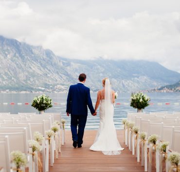couple on their wedding in mountains and sea view