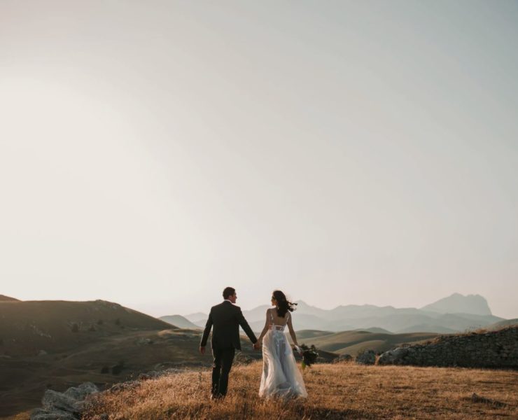 a couple on top of a hill