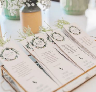 white wedding printables and invitations on white table