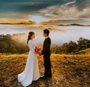 wedding couple on top of mountain