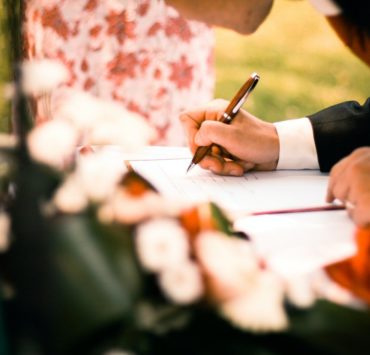 person drawing on paper