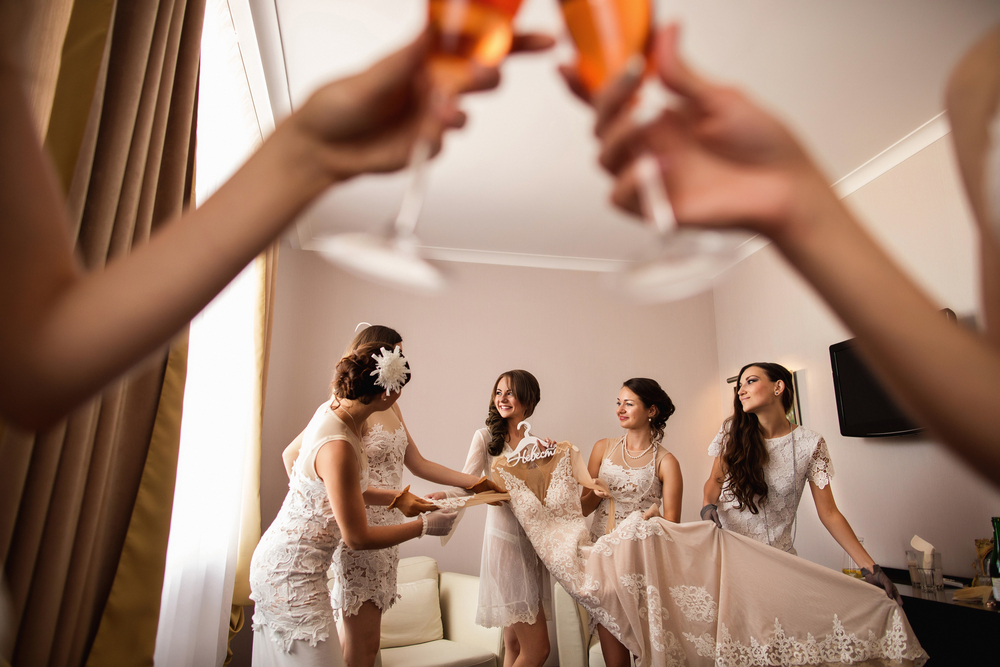 Bridesmaids having fun with bride on bridal party