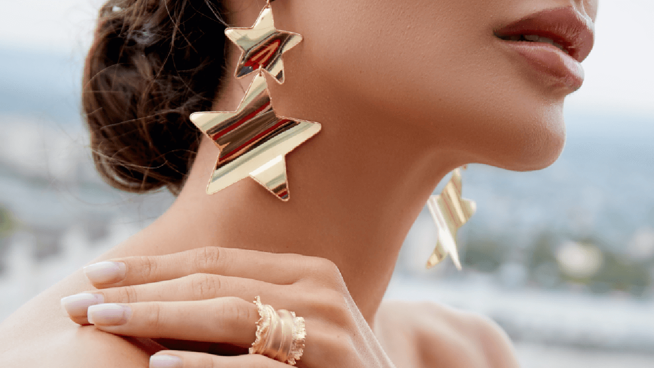 Bride wearing star earrings