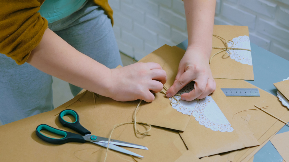 assembling wedding invitations