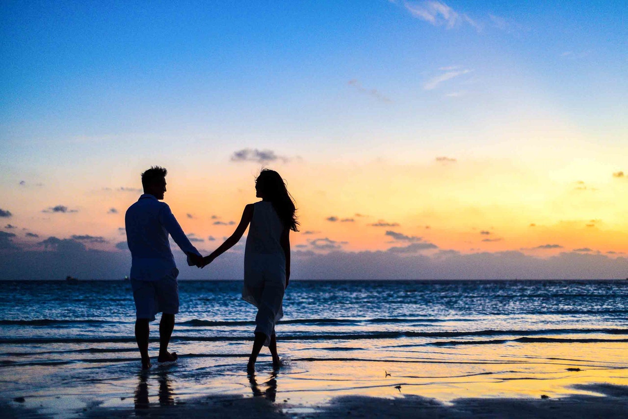 couple in a beach for a romantic getaway