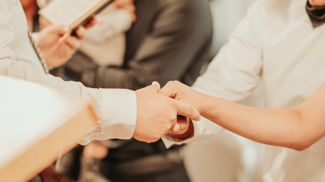 Wedding Couple Holding Hands