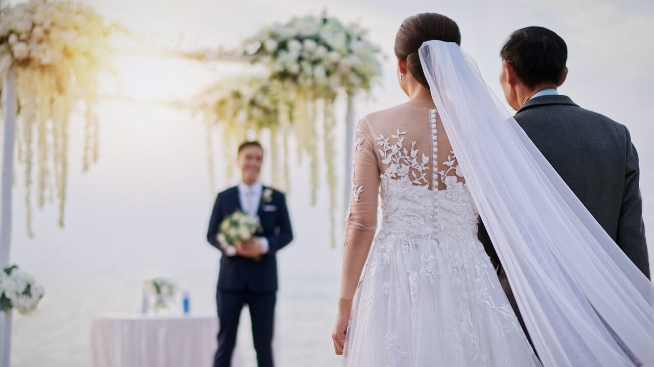 father walks daughter down aisle