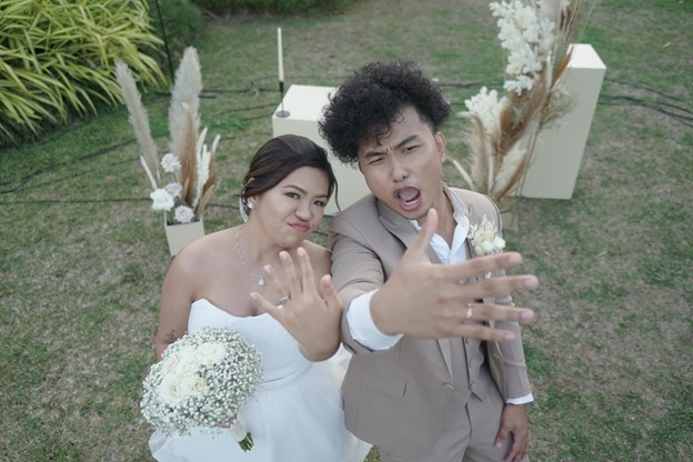 goofy couple wedding rings photo