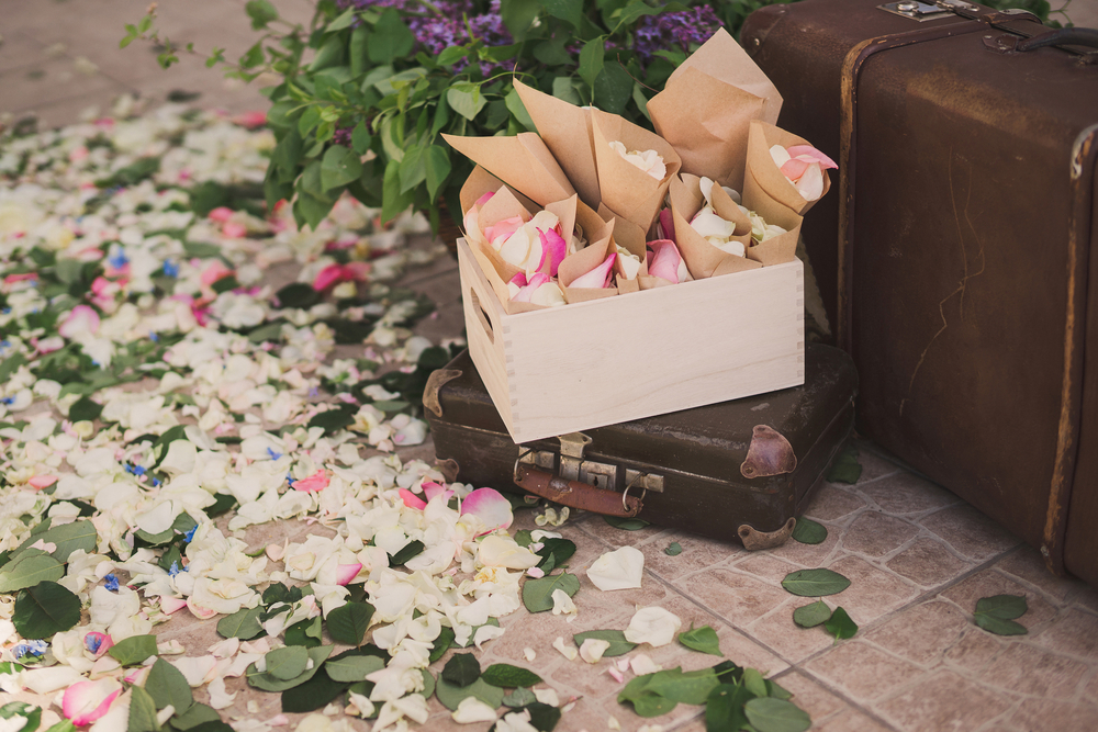 old fashioned suitcases and flowers as wedding decor