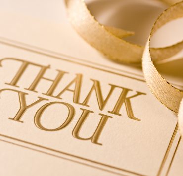 close up of a thank you card for wedding guests