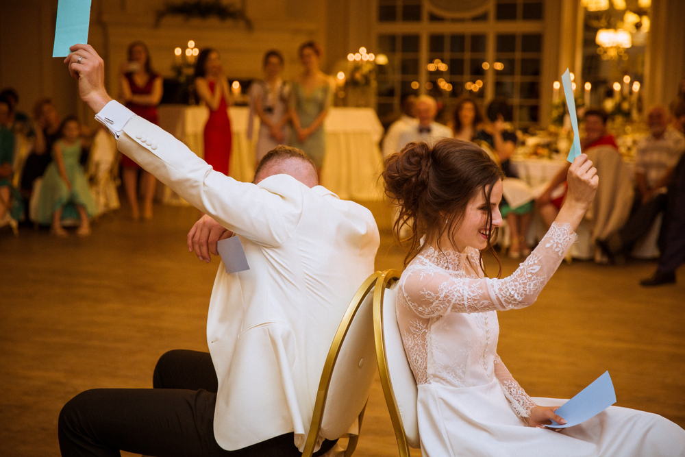 bride and groom play a guessing game