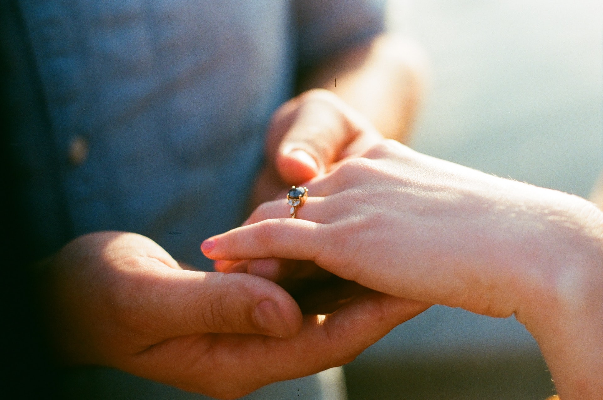 man holding his fiance's hand