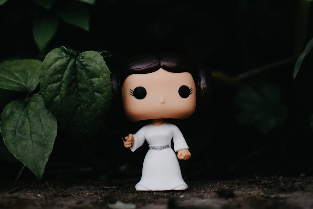 female funko pop in a white dress