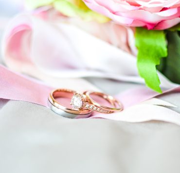 diamond ring on top of another ring