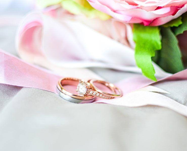 diamond ring on top of another ring