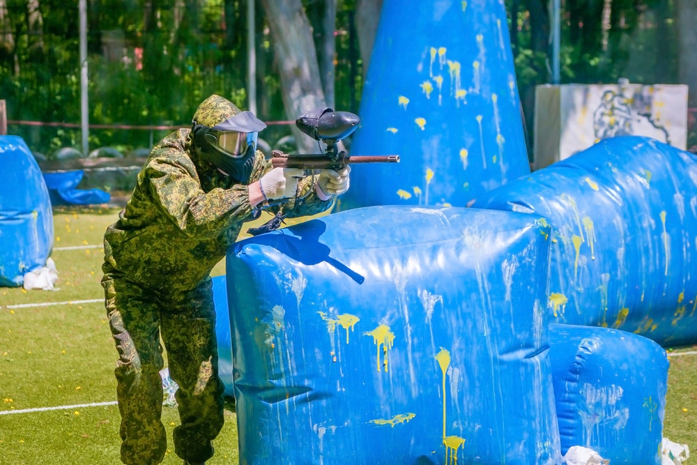 man playing paintball