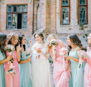bride with her bridesmaids after the wedding ceremony