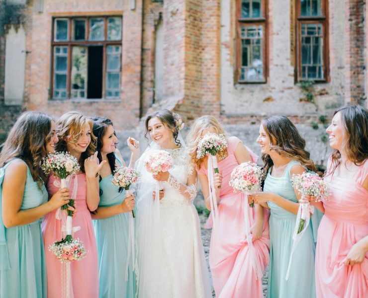 bride with her bridesmaids after the wedding ceremony