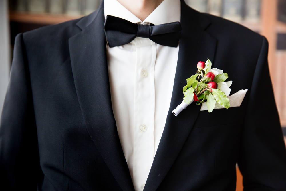 close-up image of a groom's wedding suit