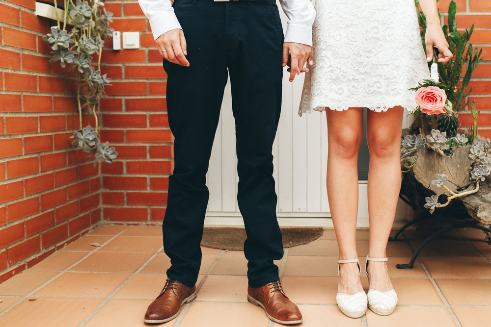 man and woman wearing semi-casual clothes for their wedding