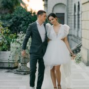 married couple walking outside the wedding venue