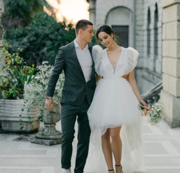 married couple walking outside the wedding venue