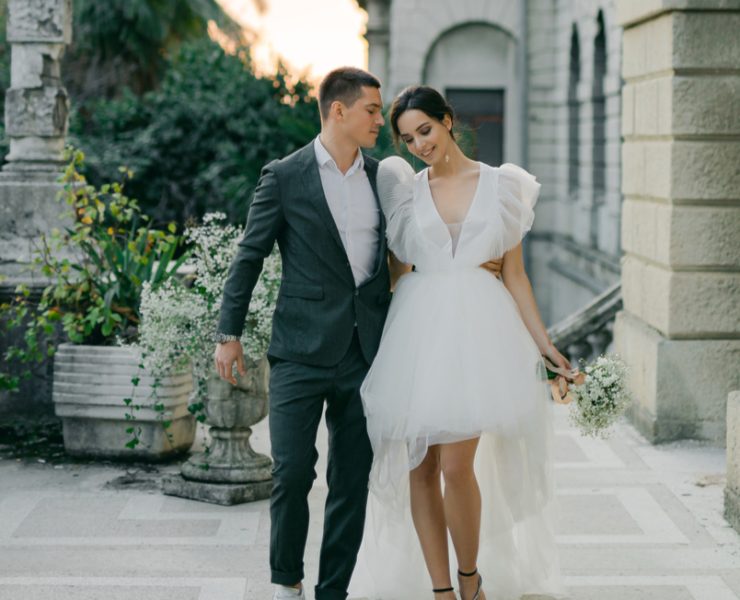 married couple walking outside the wedding venue