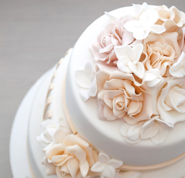 top view of a round vanilla wedding cake