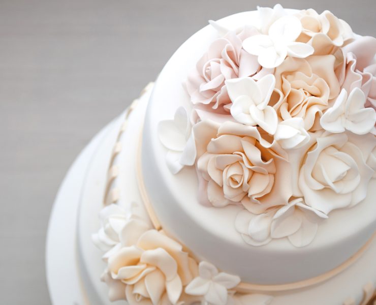 top view of a round vanilla wedding cake