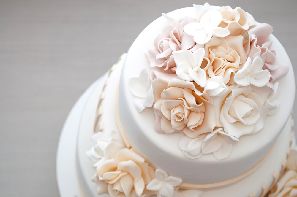 top view of a round vanilla wedding cake