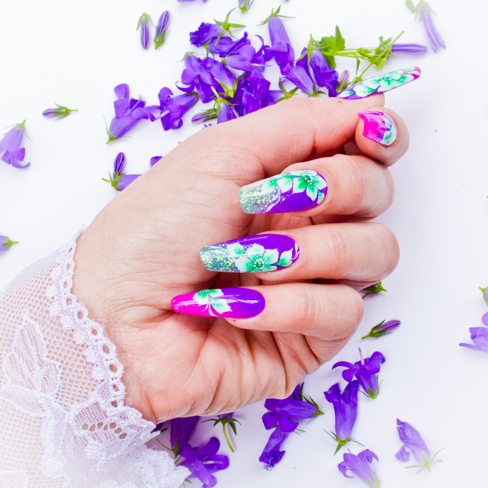 floral nail art on long nails