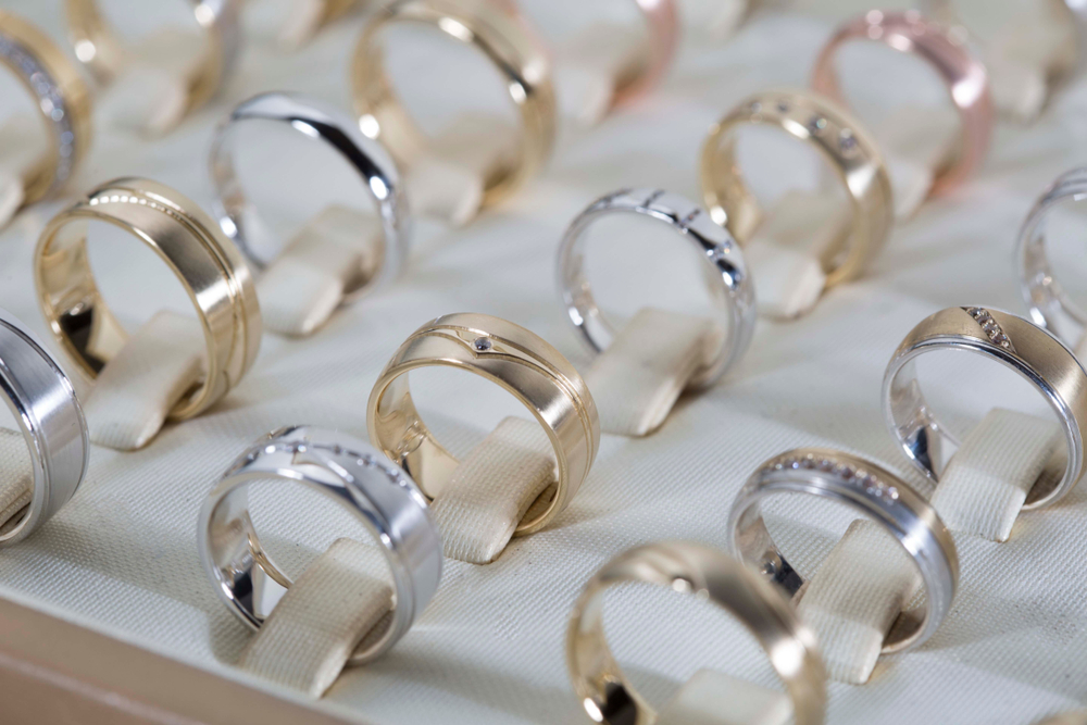 different varieties of rings for a man display on shop