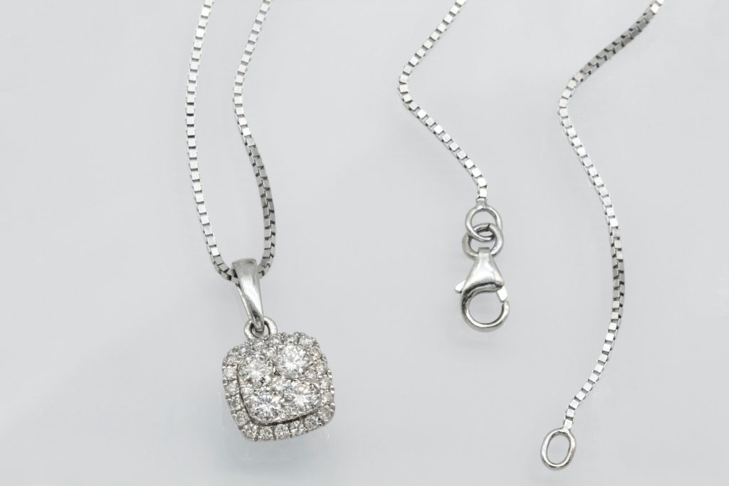 Diamond Multistone Cushion Pendant on white surface