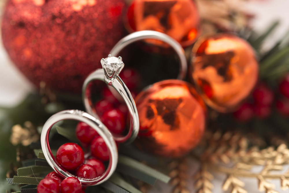 diamond engagement ring with red Christmas balls