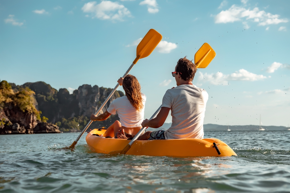 couple on sea kayaking