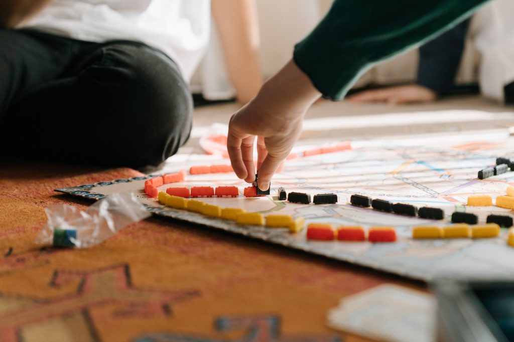 a couple playing a board game