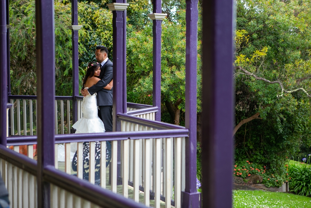 couple prenup in garden gazebo