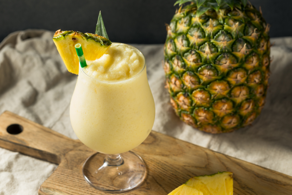 Boozy Frozen Pina Colada Cocktail with Coconut Cream