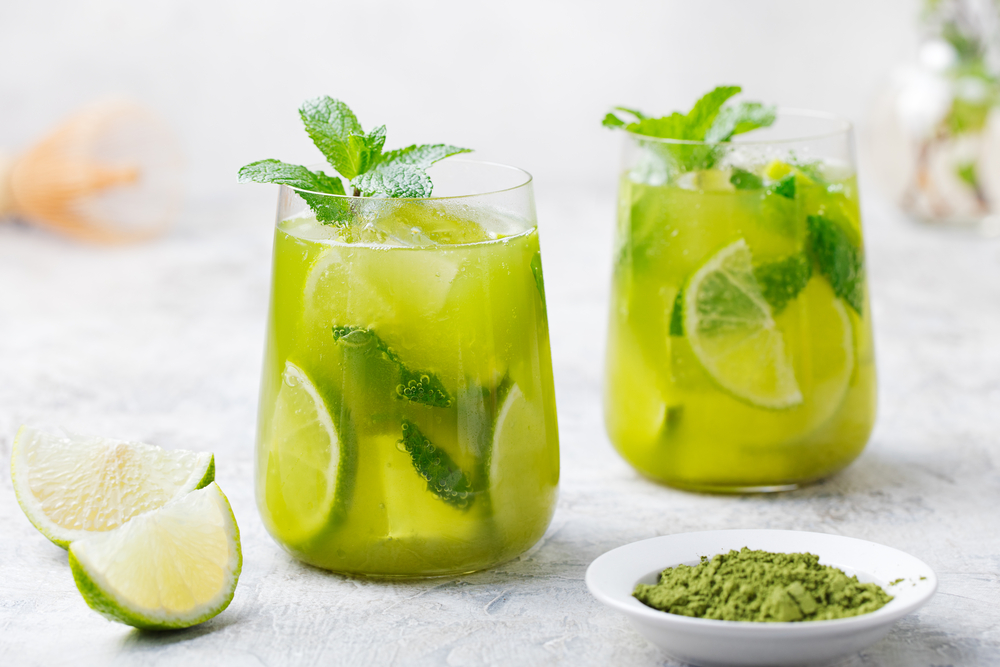Matcha mint julep with lime on a marble background