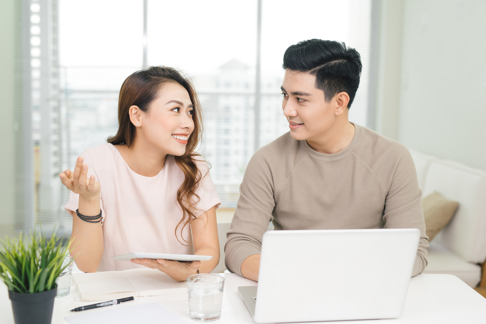 couple discussing and planning at home