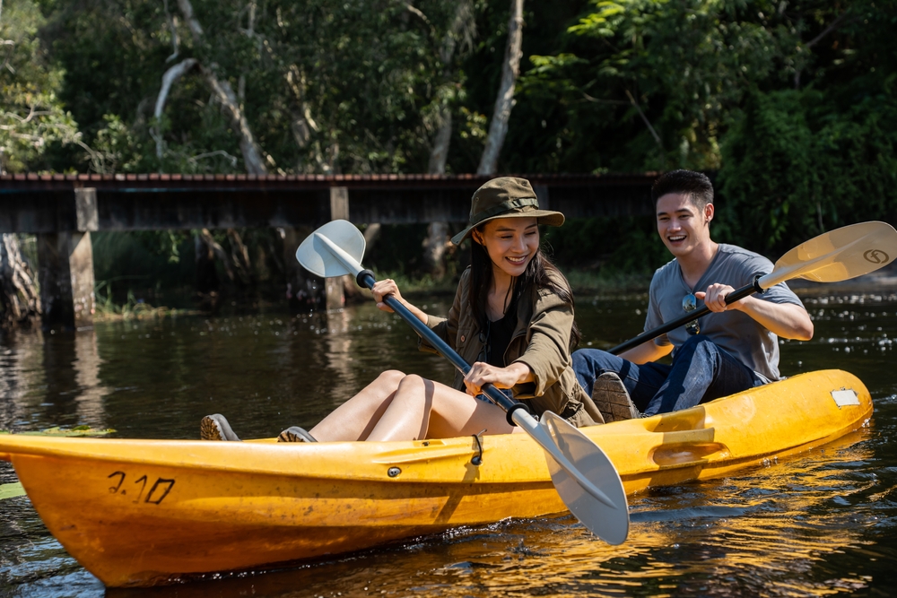 newly wed on a kayak on river