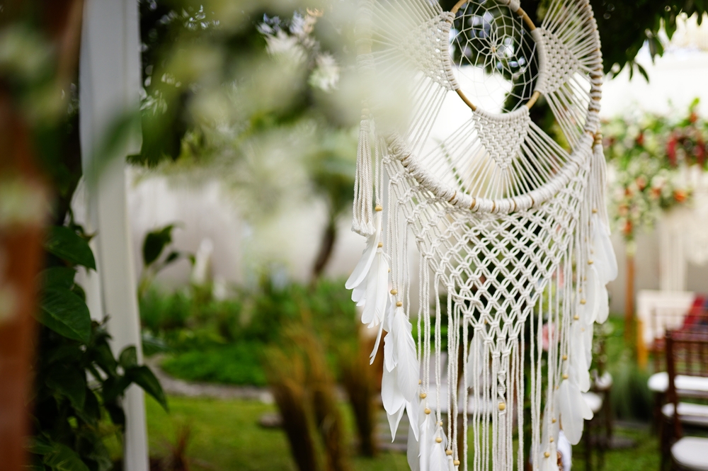 white dream catcher on Bohemian Wedding