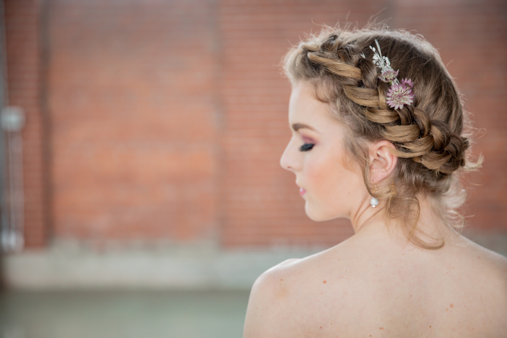 bride's side profile of crown braid hairstyle