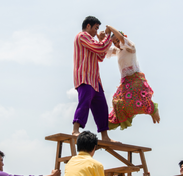 Filipino couple dancing the sayaw sa bangko (“dance on a bench”)