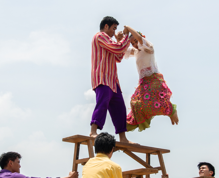 Filipino couple dancing the sayaw sa bangko (“dance on a bench”)